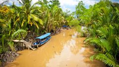 Kanal mit Boten im Mekong Delta, Ben Tre