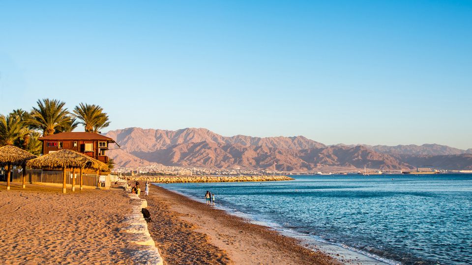 View of Eilat beach, Israel over Aqaba city, Jordan