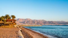 View of Eilat beach, Israel over Aqaba city, Jordan